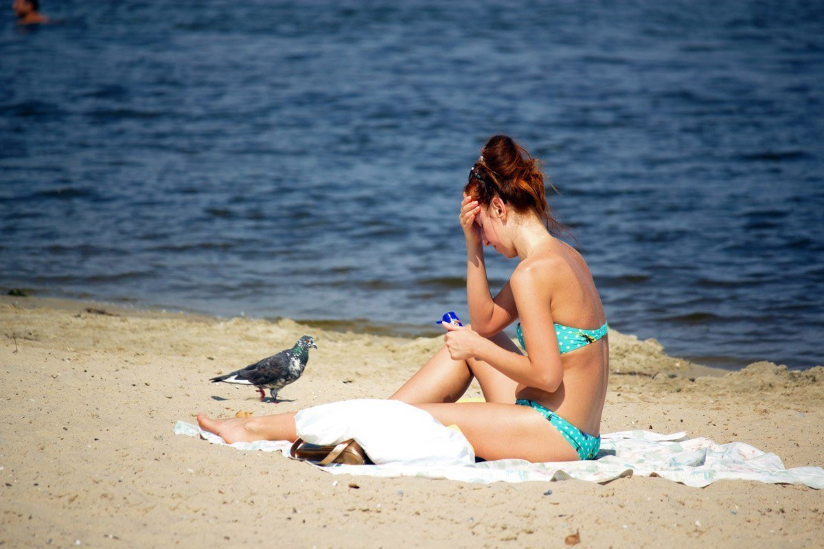 Последние теплые деньки: как жители Днепра провожают лето на пляжах 8