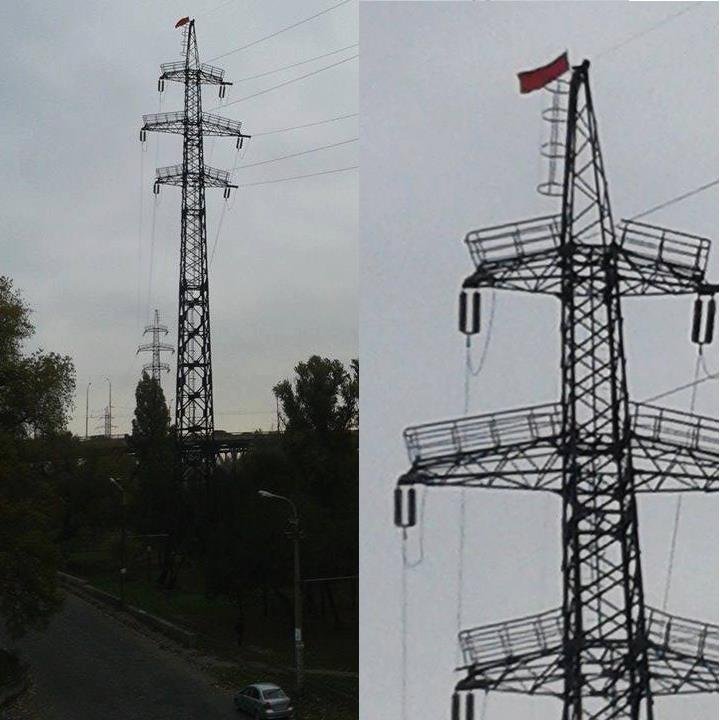 На электроопоре вывесили красный флаг На электроопоре вывесили красный флаг