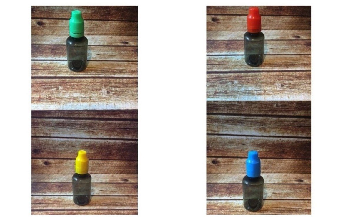 Продам черный флакон 30 мл с набором разноцветных крышечек Продам черный флакон 30 мл с набором разноцветных крышечек