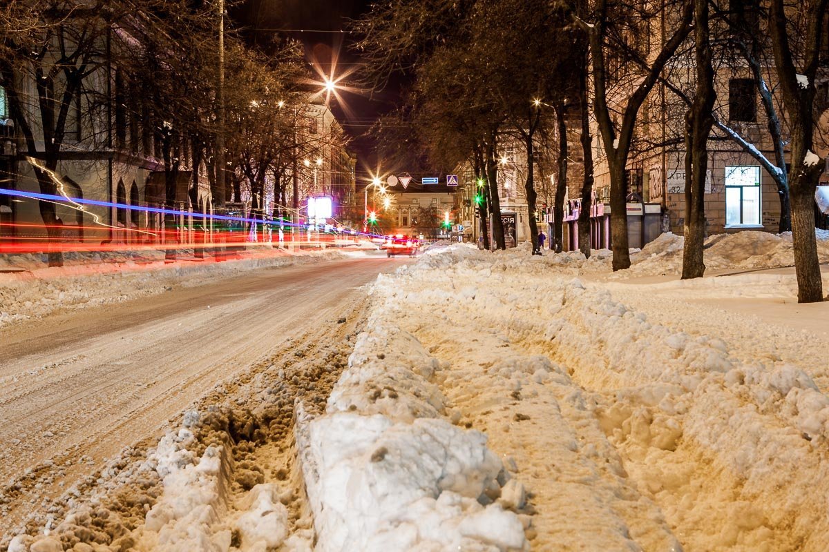 Вечерний Днепр, окутанный снежной пеленой, прекрасен
