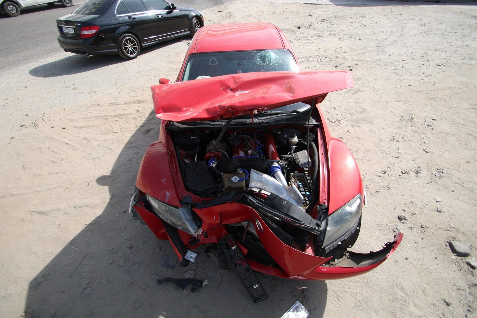 По этой же улице за автомобилем Chevrolet двигался автомобиль Mazda RX По этой же улице за автомобилем Chevrolet двигался автомобиль Mazda RX