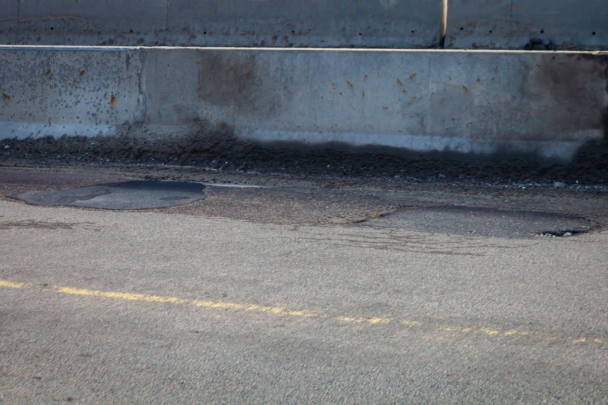 Дождались: дороги на Новом и Кайдакском мостах починили, но это ненадолго 18