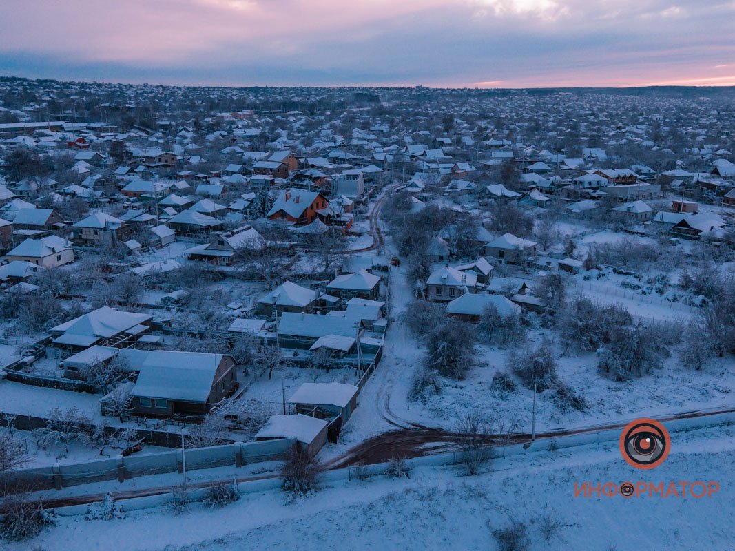 Город прячется под снегом