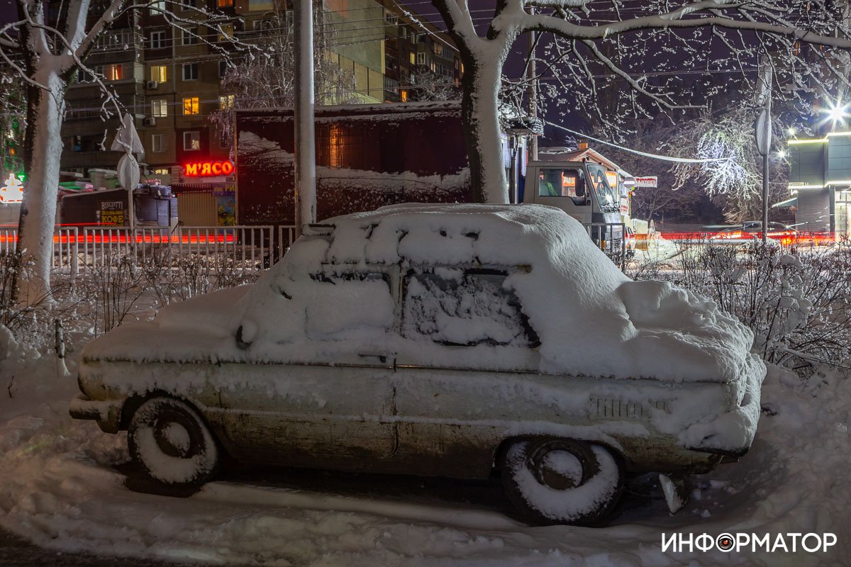 Как выглядит заснеженный Днепр ночью 7