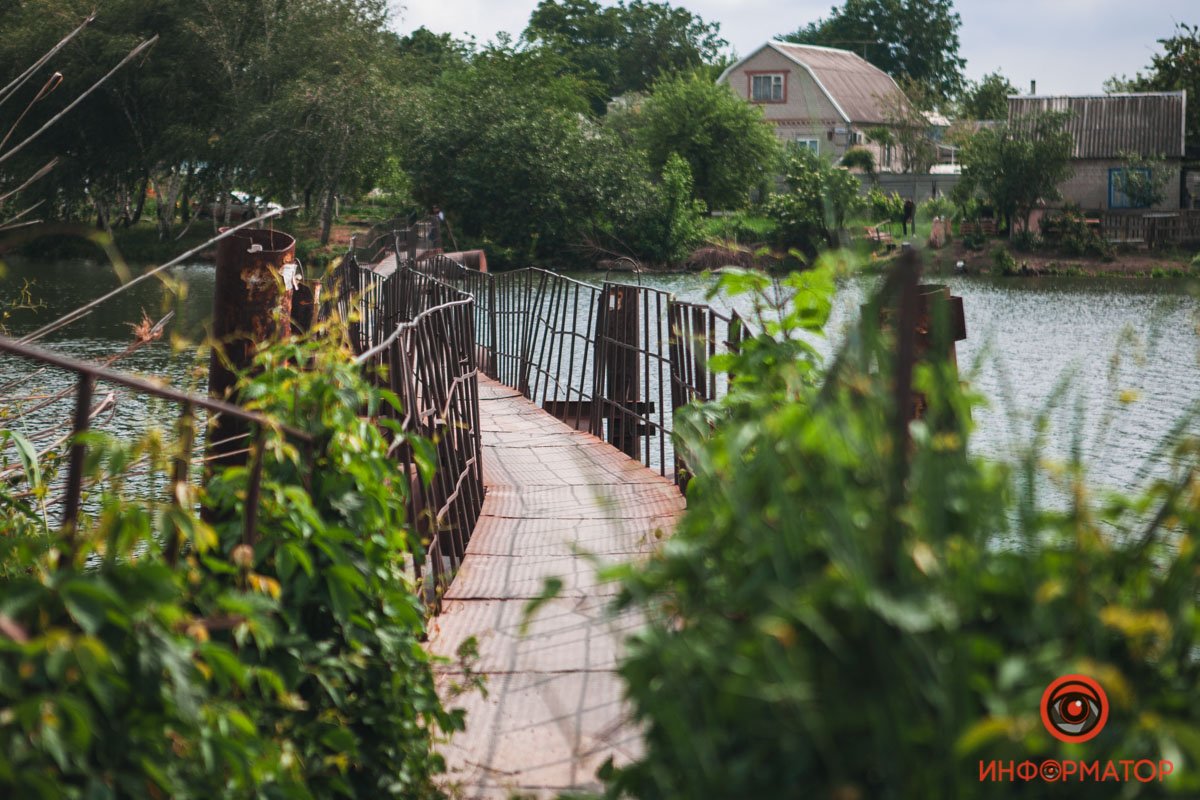 В Днепре уходит под воду мост через реку Шиянку 4