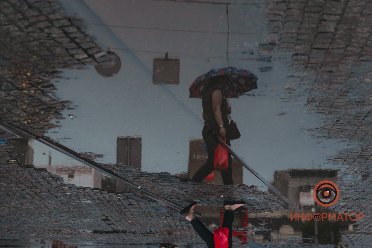 По Днепру вновь прошелся летний дождь: непогода в фото 16