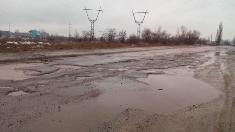 Ямы-ловушки на улице Курсантской: поселок Шевченко теряет "связь" с городом (ФОТО) 1