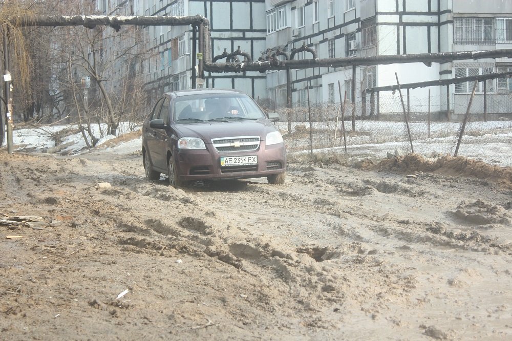 Дело "труба": как на Тополе люди утопают в грязи (ФОТО) 14