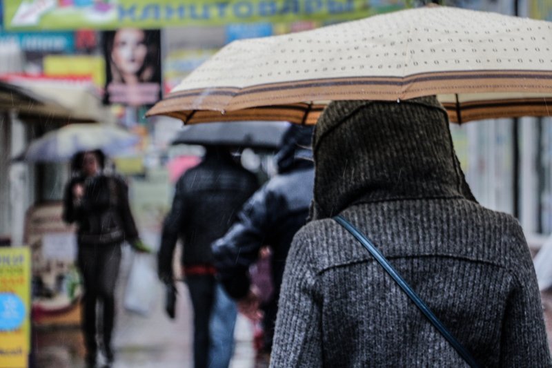Не забудьте зонт: в Днепр вернулись холод и дождь со снегом 18