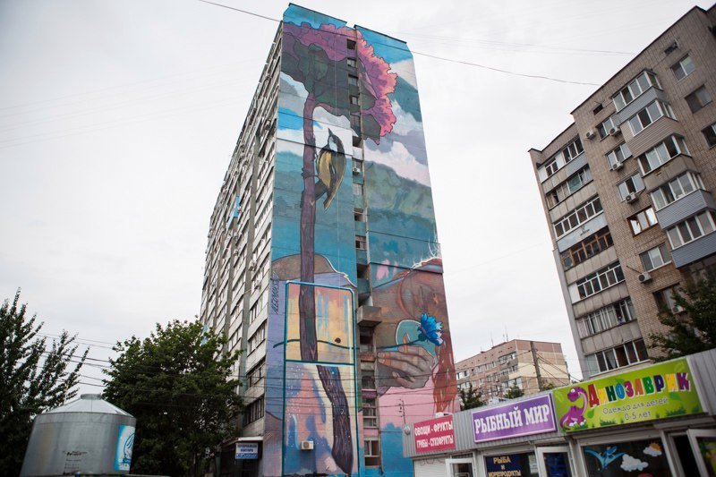 Мастерство художников и восхищенные взгляды прохожих: в Днепре появился новый мурал 1