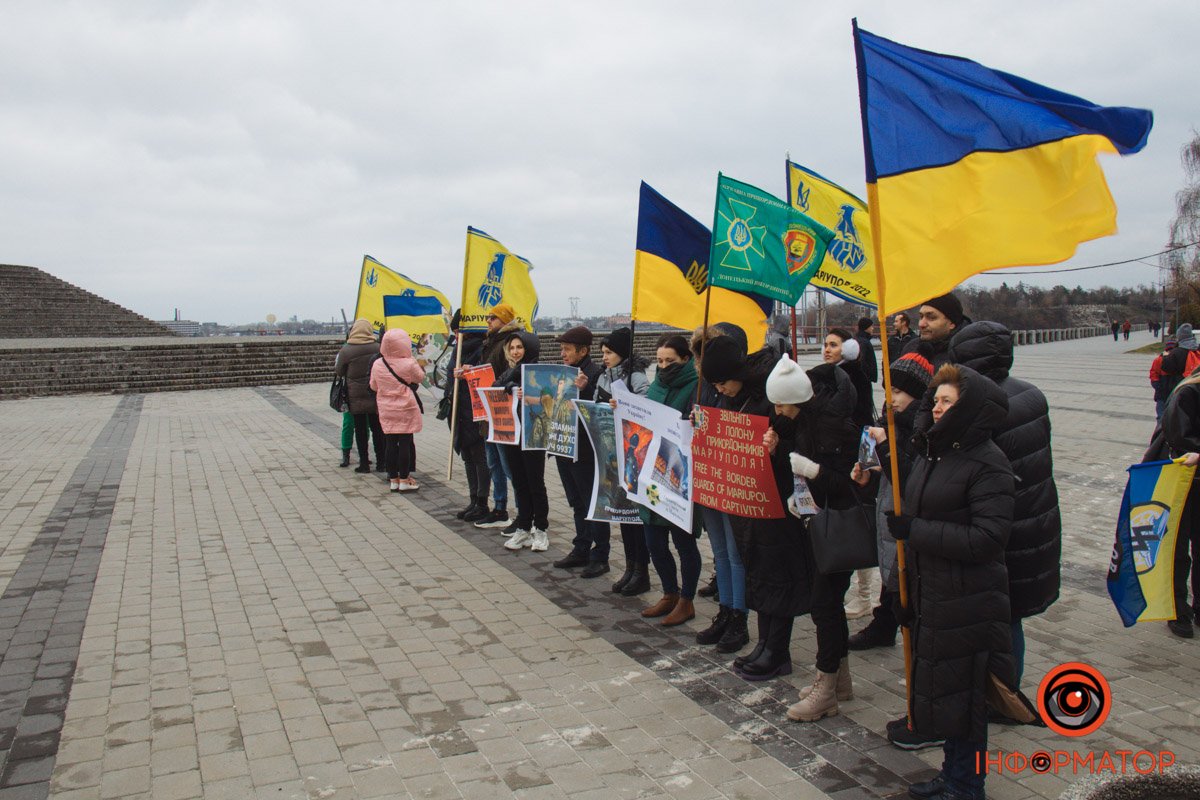 Люди з плакатами Люди з плакатами