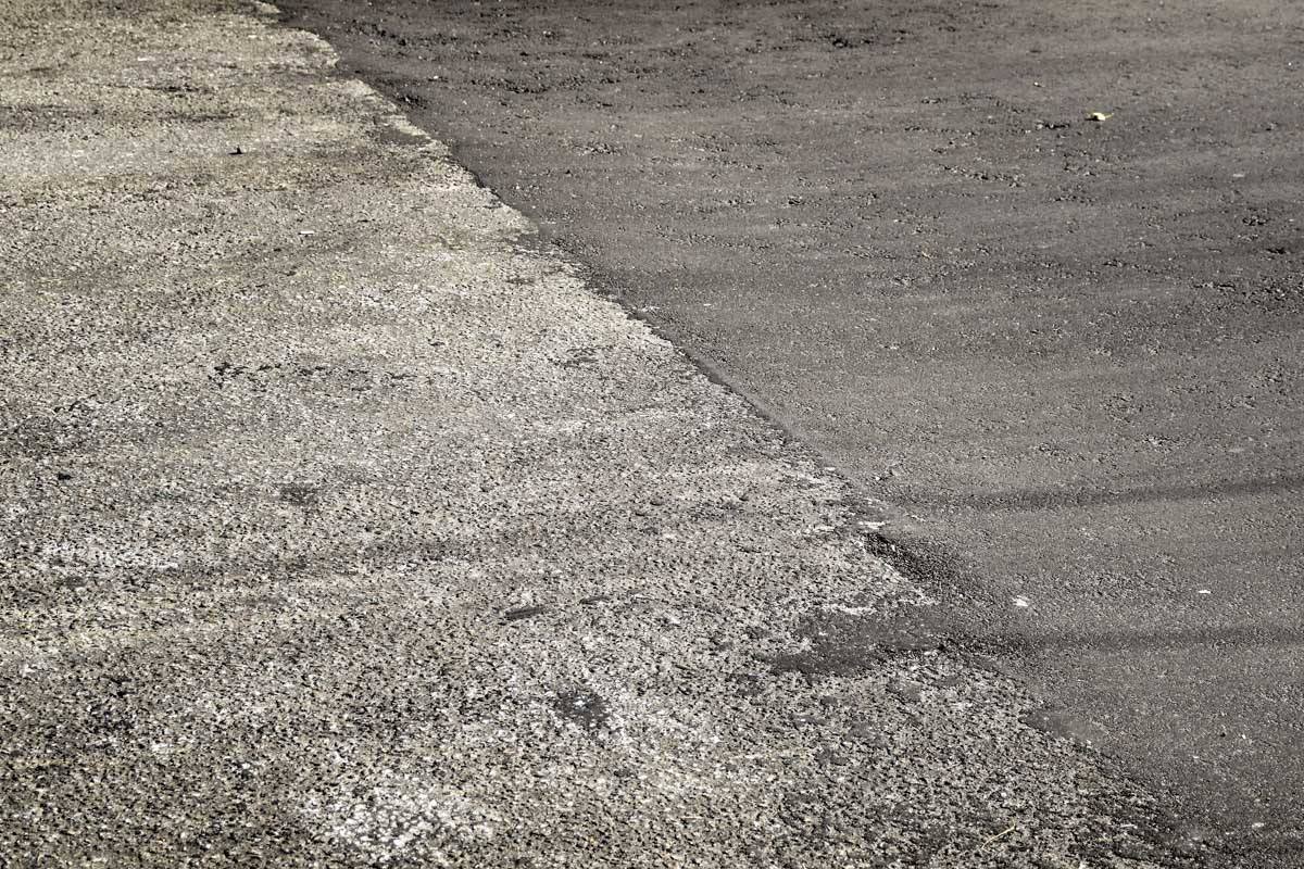 Пока уложили первый слой нового асфальта