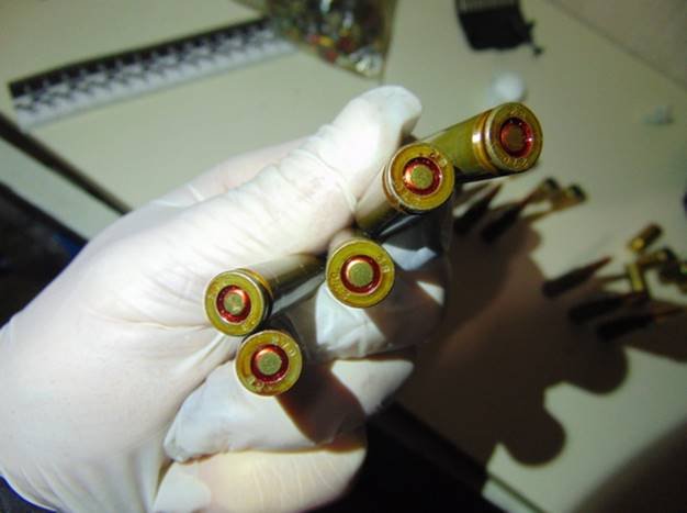 В Киеве задержали мужчину, хранившего дома пистолет и десятки патронов 2