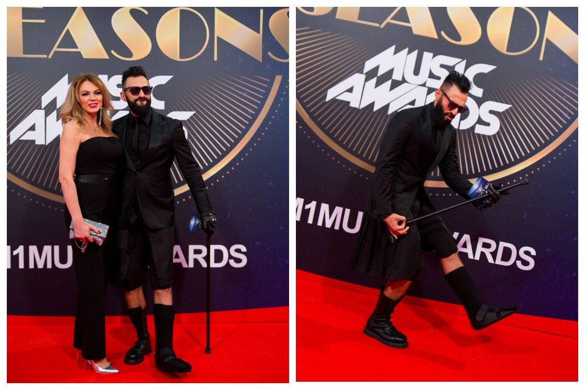 Певец Кише с палочкой и своей роскошной спутницей