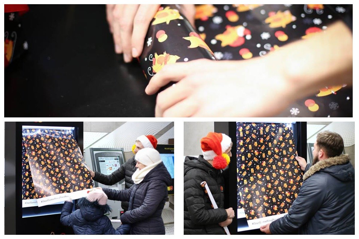 Стенд с подарочной бумагой на станциях метро Киева Стенд с подарочной бумагой на станциях метро Киева