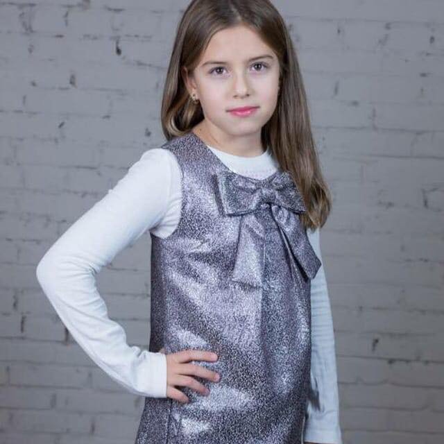 Самойленко Полина была одета в розовое пальто