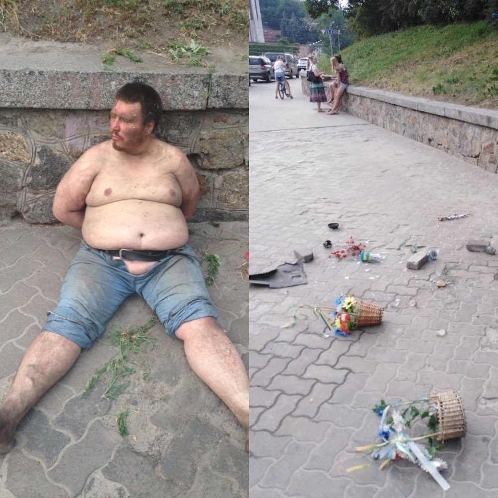 Мужчина разбросал установленные у памятника лампады со свечами и цветы, возложенные активистами