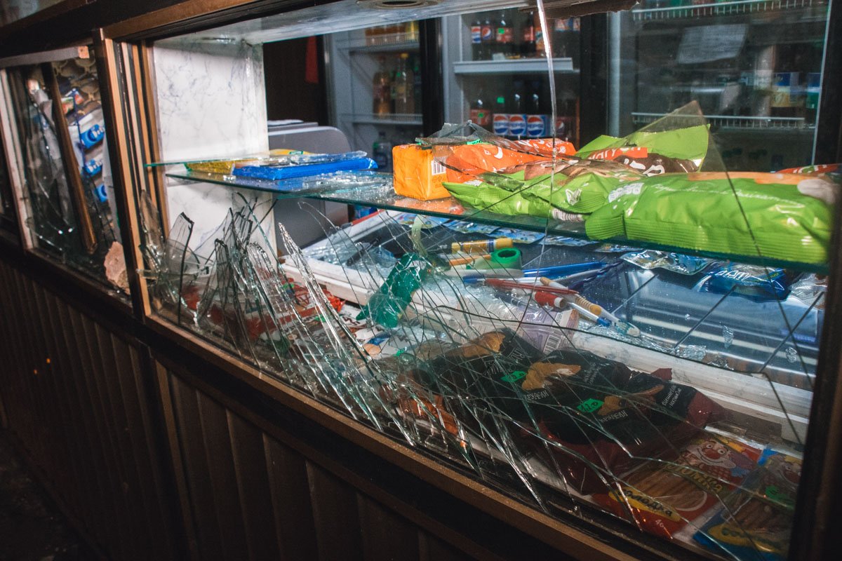 Тогда он также бросил камень и разбил стекло заведения