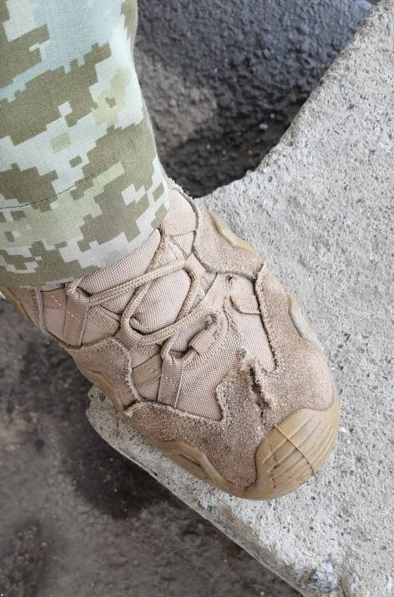 Боевики с беспилотника обстреляли КПВВ «Гнутово»: одного из бойцов спас его личный жетон 4