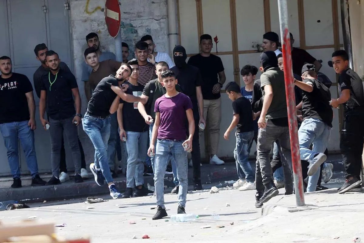 Палестинці у таборі Палестинці у таборі