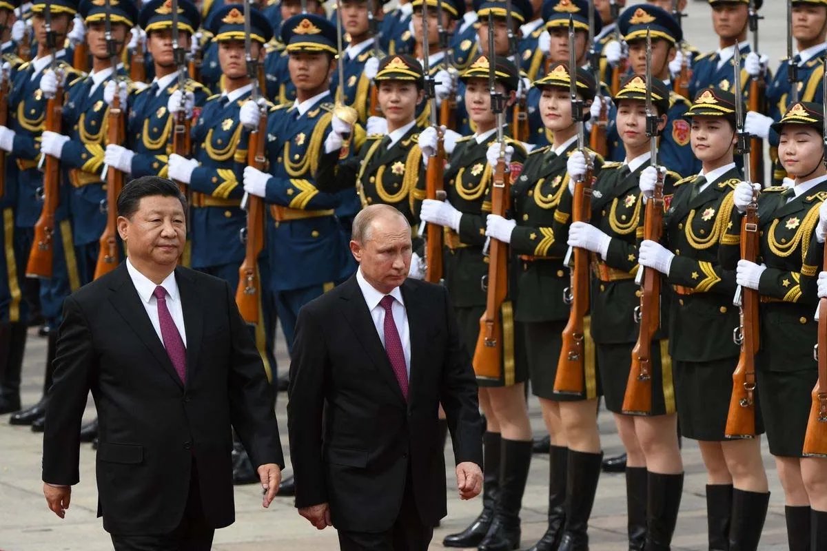 Путін та Сі Путін та Сі