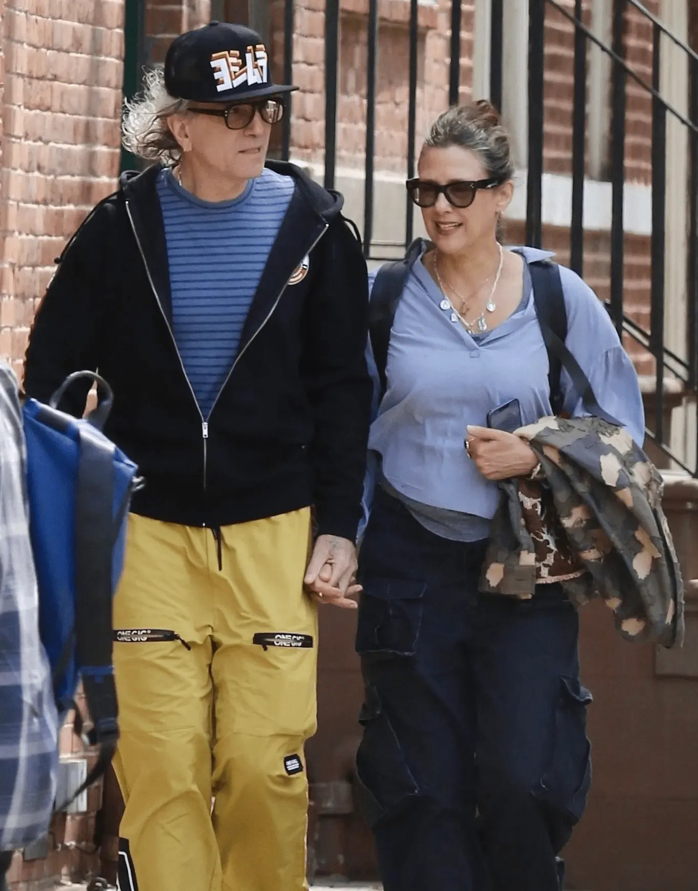 Актёр с женой Ребеккой Миллер