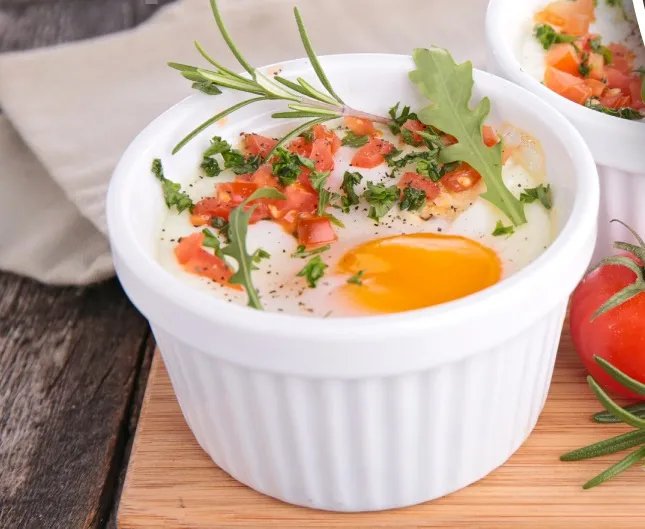 Запечені яйця зі шпинатом