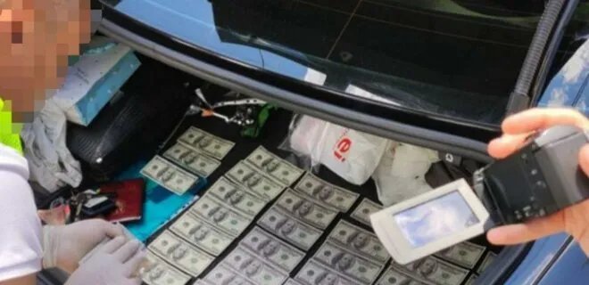 Гадалка взяла за услуги 300 тысяч долларов. Фото: Офис Генпрокурора Гадалка взяла за услуги 300 тысяч долларов. Фото: Офис Генпрокурора