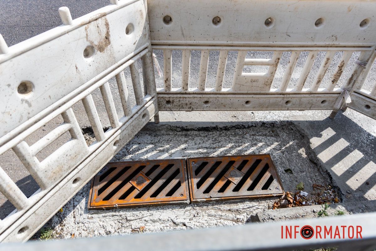 В Днепре на Набережной Победы огородили дождеприемники: движение частично ограничено 4