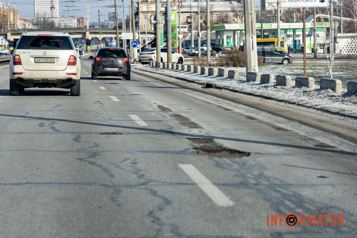 Сніг розтанув разом з асфальтом: мости Дніпра не пережили зиму 5