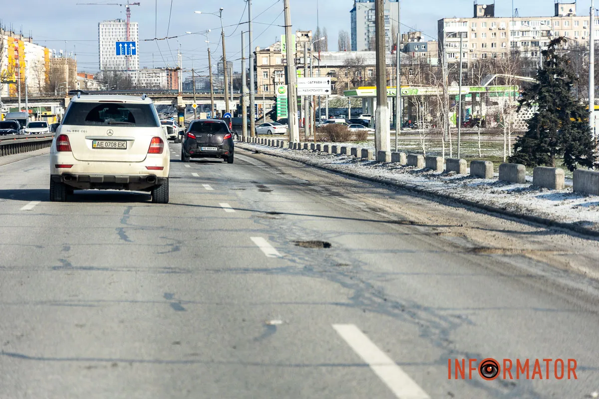 Сніг розтанув разом з асфальтом: мости Дніпра не пережили зиму 6