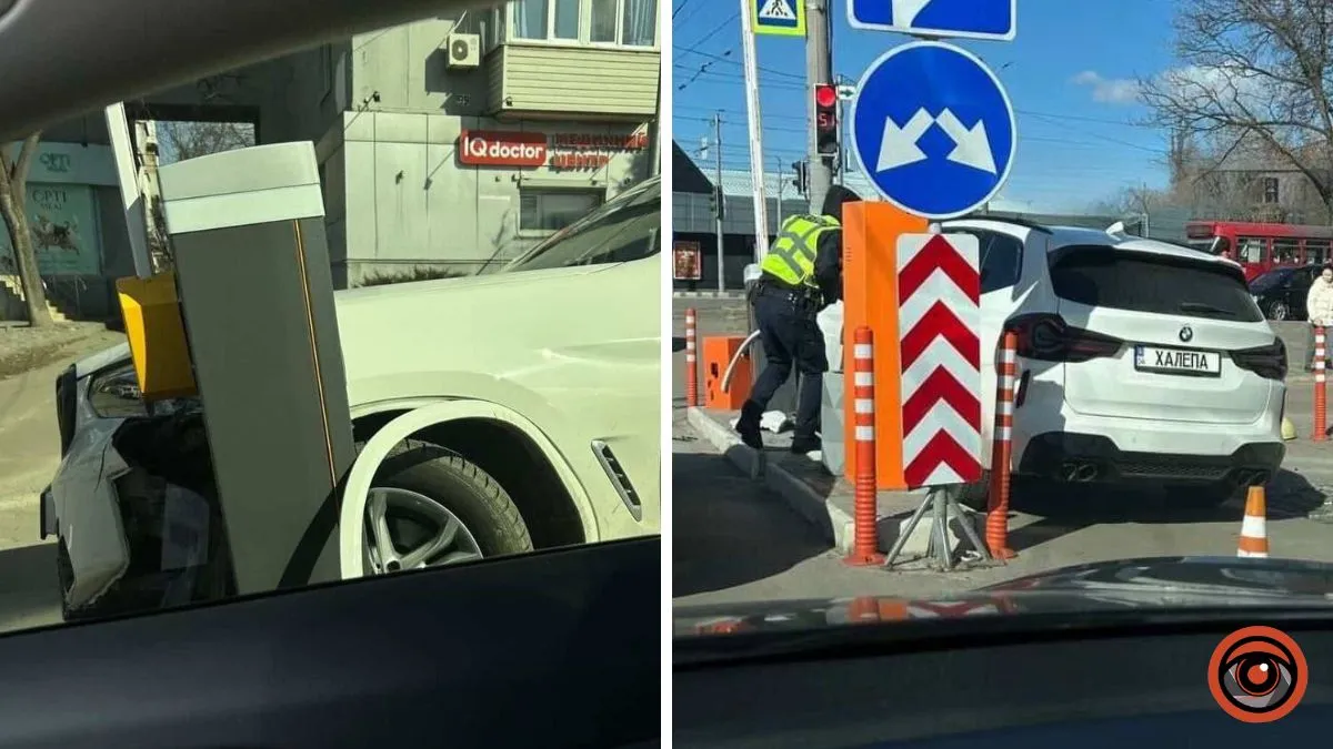 У Дніпрі на виїзді з парковки ТРЦ NEO PLAZA у ДТП потрапив BMW X3 з номерами «ХАЛЕПА»: відео моменту