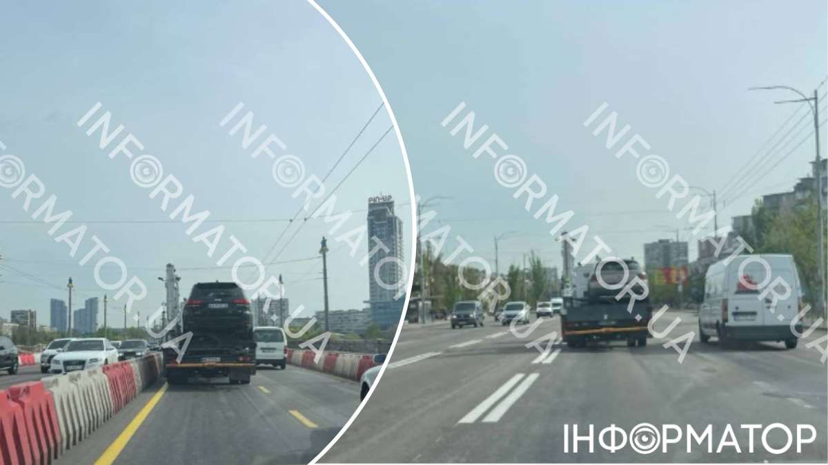 Ми зафіксували, як евакуатори переміщають різні автівки на лівий берег спочатку мостом Патона, потім - проспектом Соборності (колишній Возз'єднання)