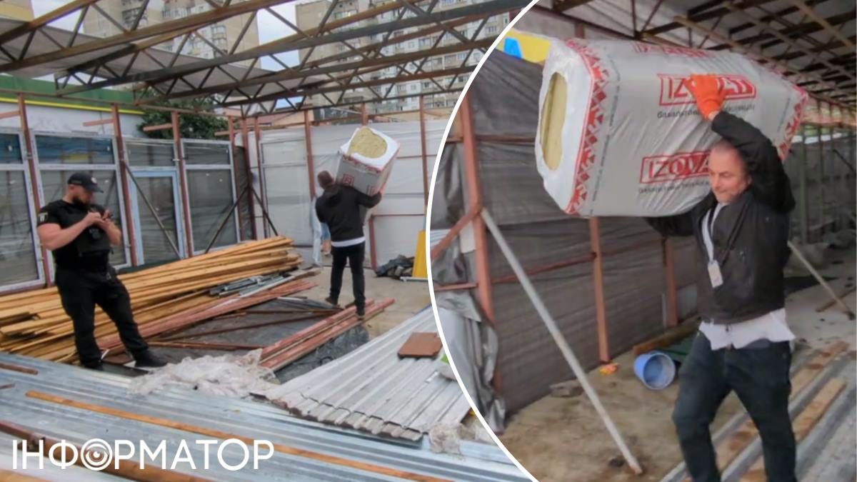 Очільник Деснянської РДА самотужки вхопив декілька пакунків з утеплювачем, що стояли всередині, й виніс назовні. Фото: скріншот з відео Бахматова