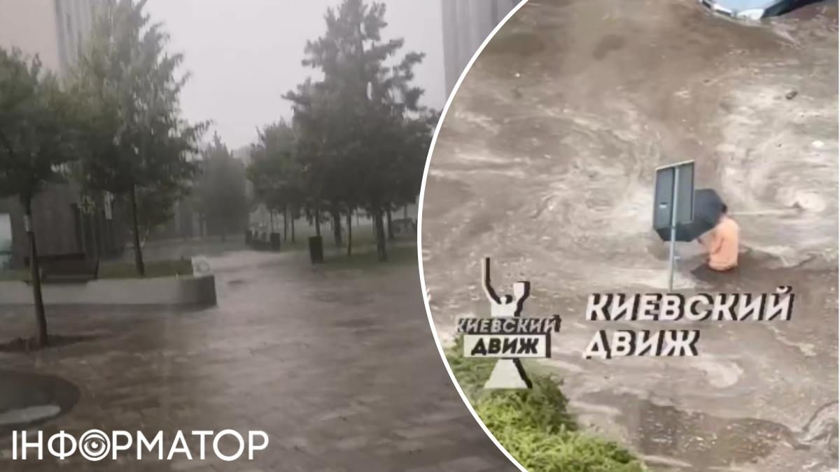 З парасолькою під водою: кияни зняли, як чоловік долає вулицю у районі Либідської площі. Фото: соцмережі З парасолькою під водою: кияни зняли, як чоловік долає вулицю у районі Либідської площі. Фото: соцмережі