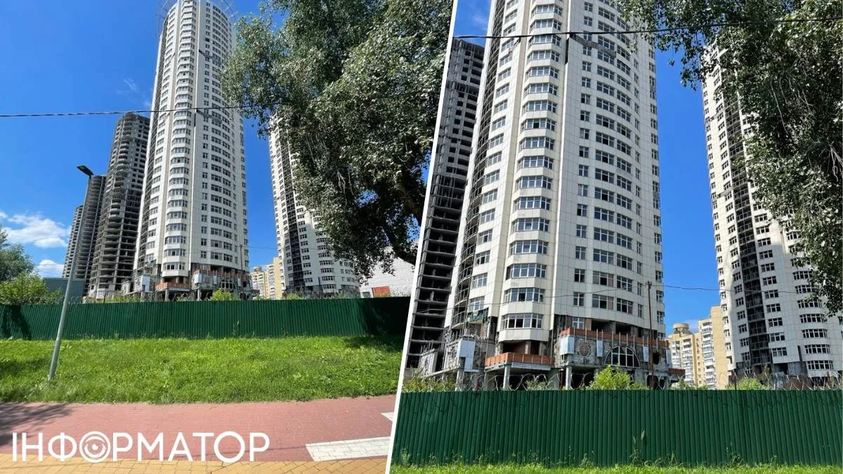 Недостройка огорожена по кругу зеленым забором, поверх которого протащили колючую проволоку.