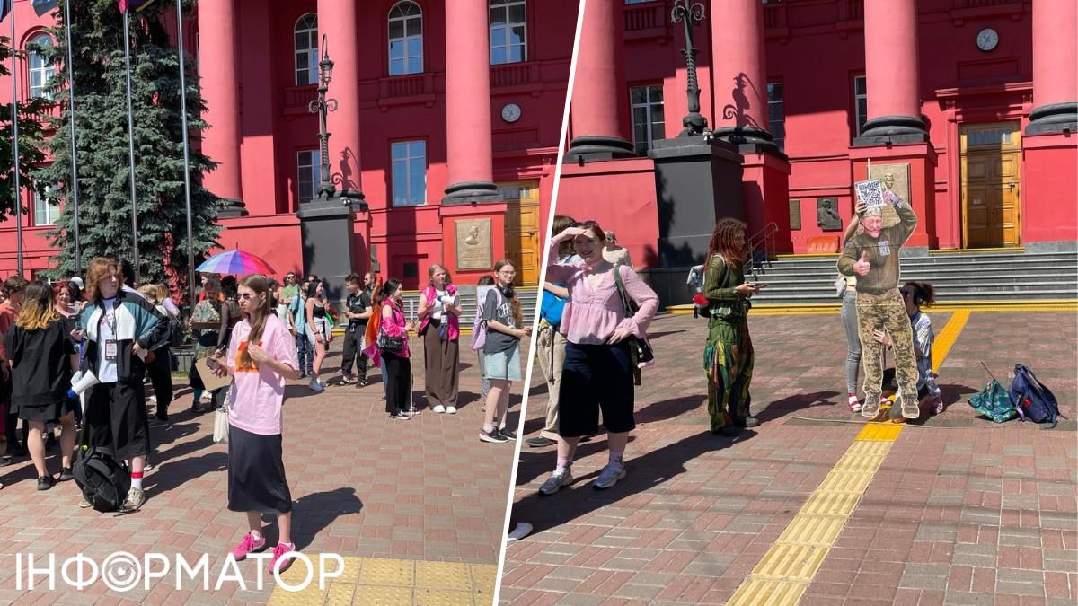 Учасники КиївПрайду збираються під "червоним" корпусом, хтось встановив картонну фігуру військового з QR-кодом