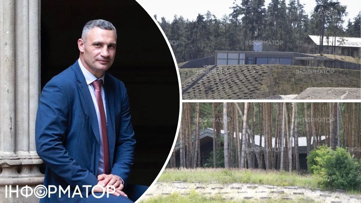 деревянный особняк в стиле альпийского шале, возведенный среди сосен на берегу Киевского водохранилища