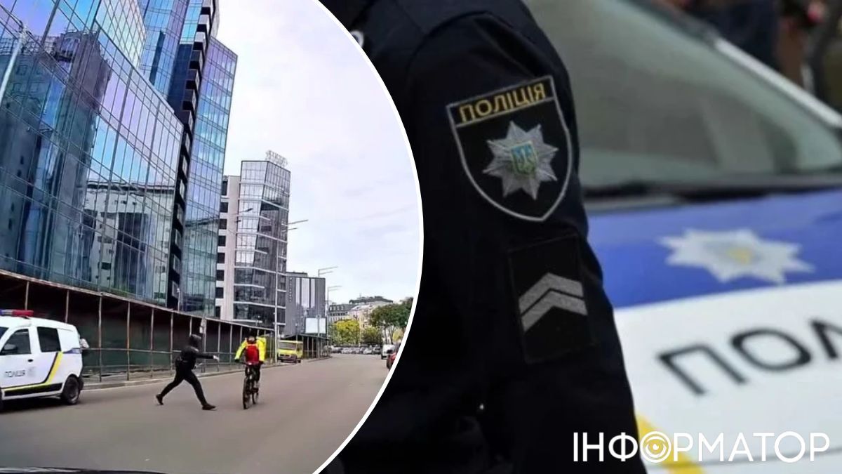 поліцейський збиває велосипедиста
