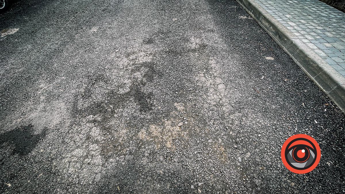 На вул. Новодворського також руйнується новий асфальт 4