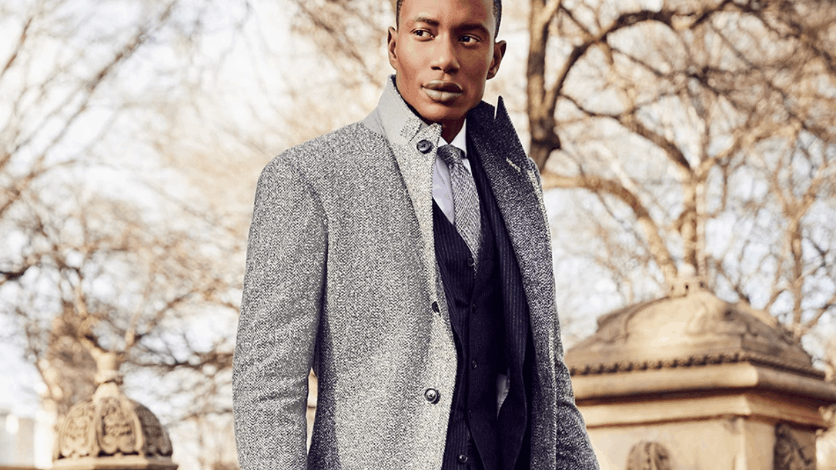 Класика, що ніколи не виходить із моди: як вибрати верхній одяг під костюм