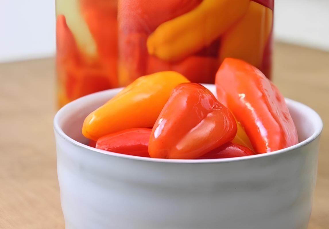 За этим рецеэптом перцы фаршируются капустой. Консервируем сладкие перцы необычным способом 1