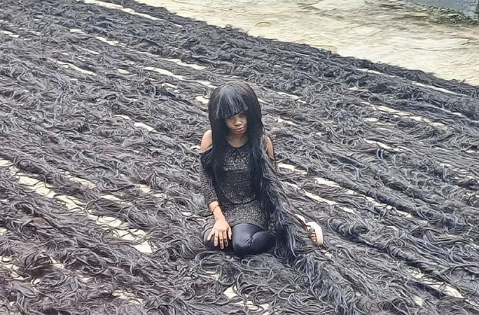 Хелен Вільямс із Нігерії встановила світовий рекорд Гіннеса як володарка найдовшої перуки ручної роботи