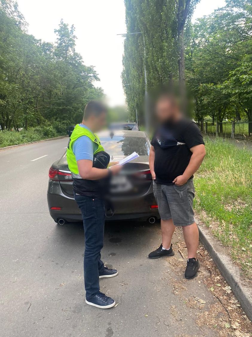 Спілкування з підозрюваним. Фото: Київська міська прокуратура