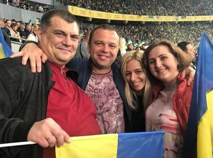 Юрий Корявченков и Александр Фастовец с женами на футбольном матче Украина – Португалия