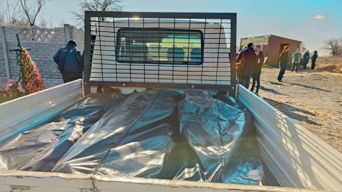 На Київщині знайшли нове поховання цивільних, яких вбили росіяни