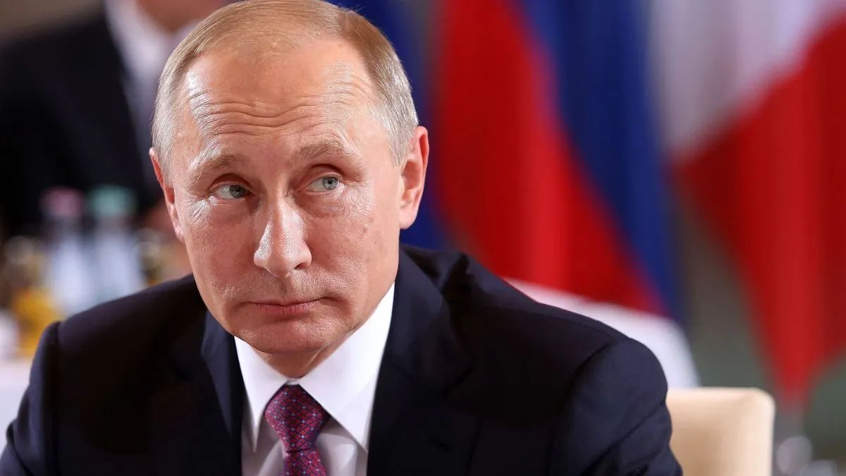 путін