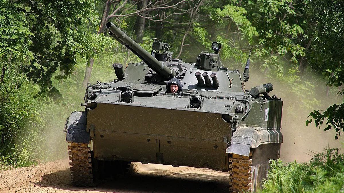 росія