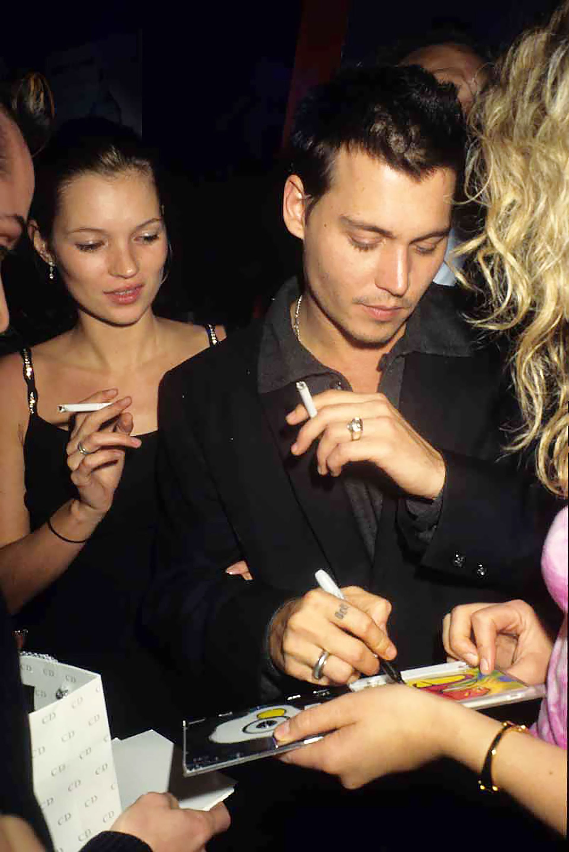 Кейт Мосс і Джонні Депп. Фото: Getty Images Кейт Мосс і Джонні Депп. Фото: Getty Images