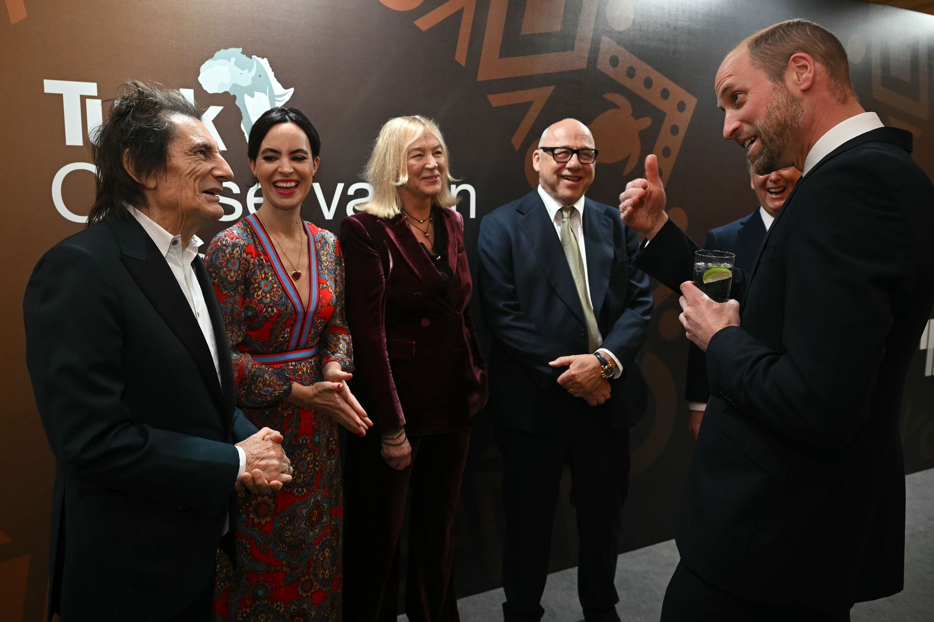 Принц Уильям в компании Ронни Вуда и Марка Нопфлера. Фото: Getty Images Принц Уильям в компании Ронни Вуда и Марка Нопфлера. Фото: Getty Images